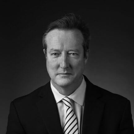 Black and white portrait photo of Thomas J. Henry Attorney Nick Winkler